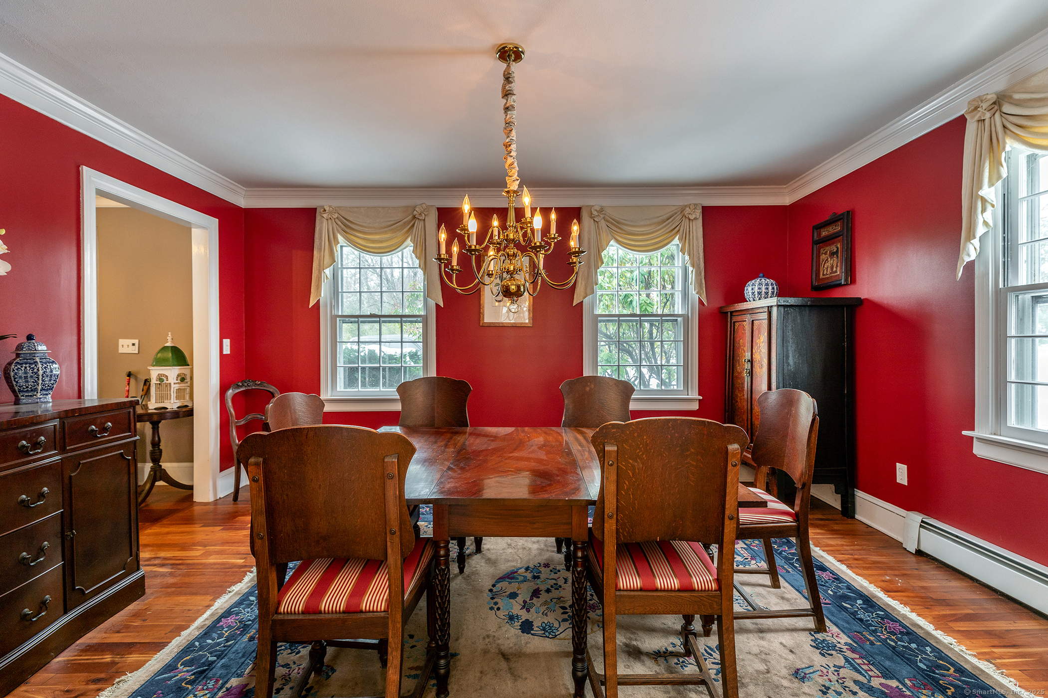 5 North Street Roxbury, CT 06783 - Photo 15 of 28 a view of a dining room with furniture window and wooden floor