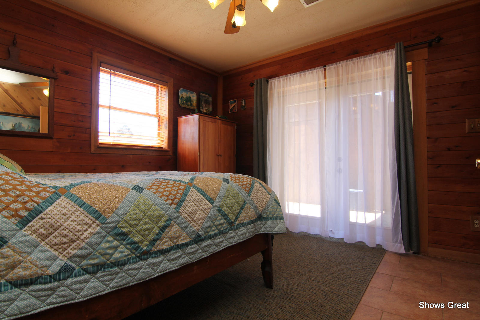 1877 Trails End Road Goodview, VA 24095 - Photo 22 of 32 a bed sitting in a bedroom next to a window
