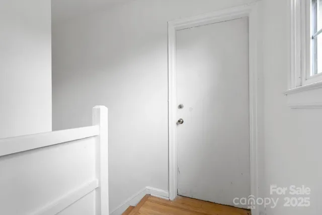 a view of small space with wooden floor