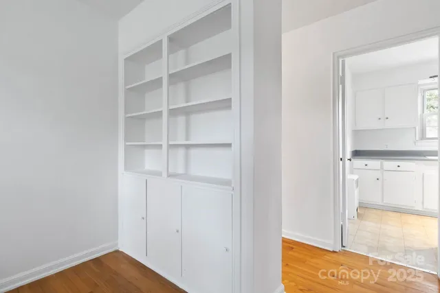 a view of kitchen with wooden floor