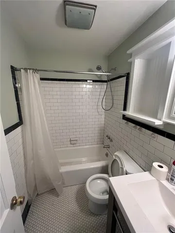 a bathroom with a sink and a shower