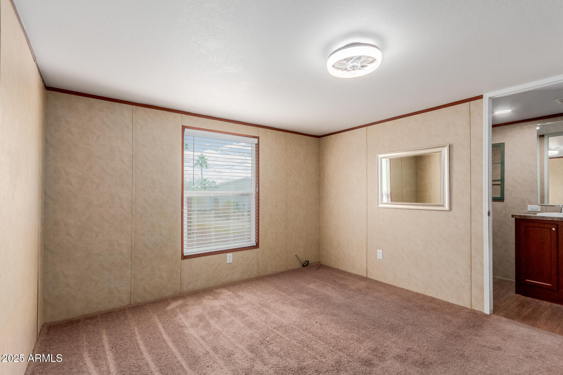 2000 South Apache Road, Unit 395 Buckeye, AZ 85326 - Photo 12 of 36 a view of an empty room with a window