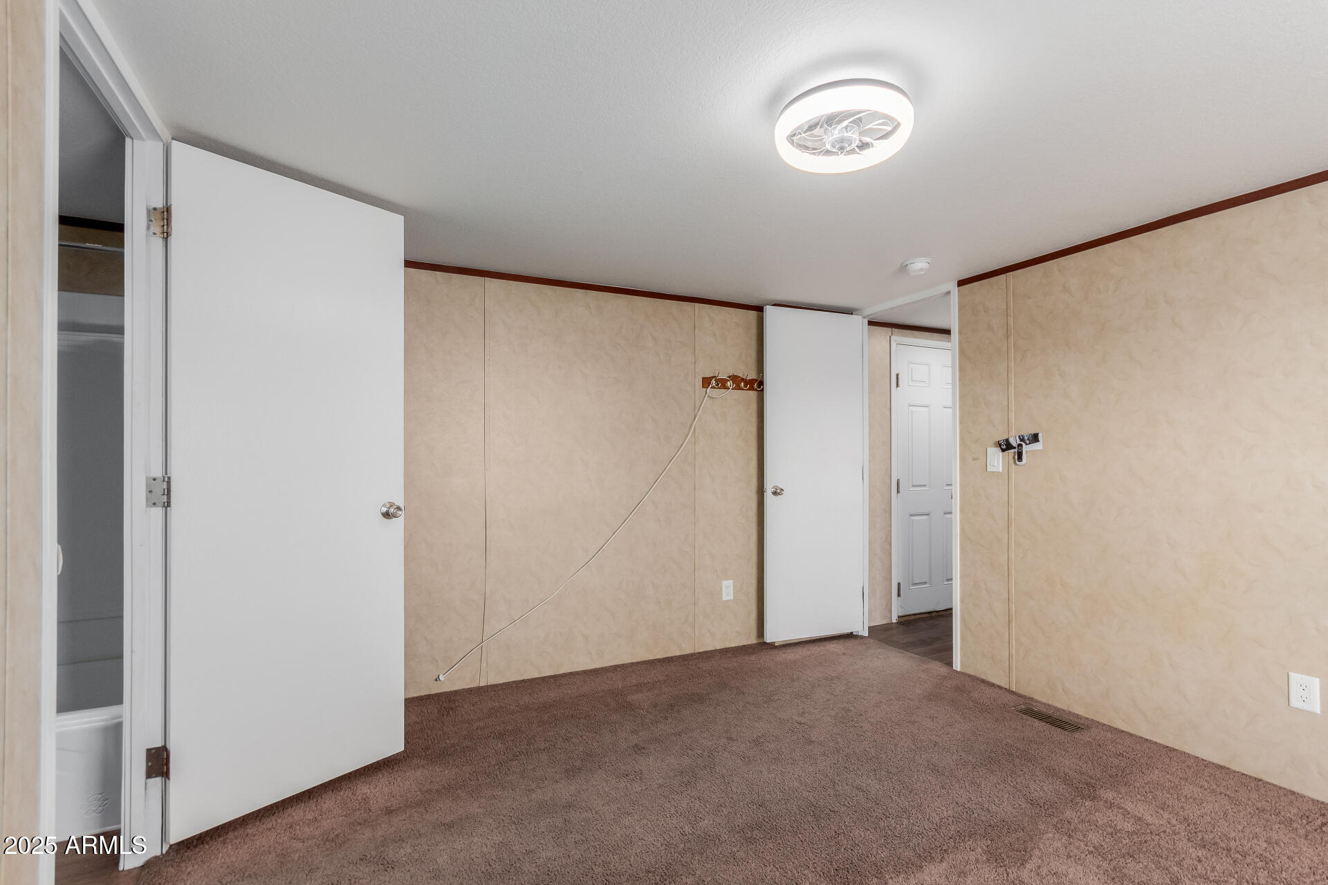 2000 South Apache Road, Unit 395 Buckeye, AZ 85326 - Photo 14 of 36 a view of room with walk in closet