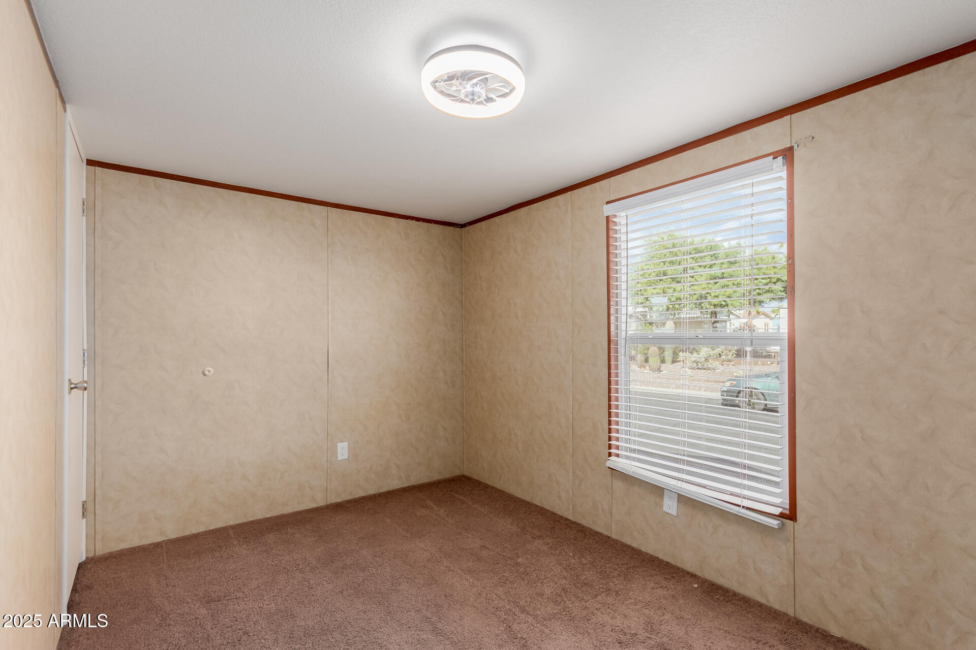 2000 South Apache Road, Unit 395 Buckeye, AZ 85326 - Photo 17 of 36 a view of a room with a window