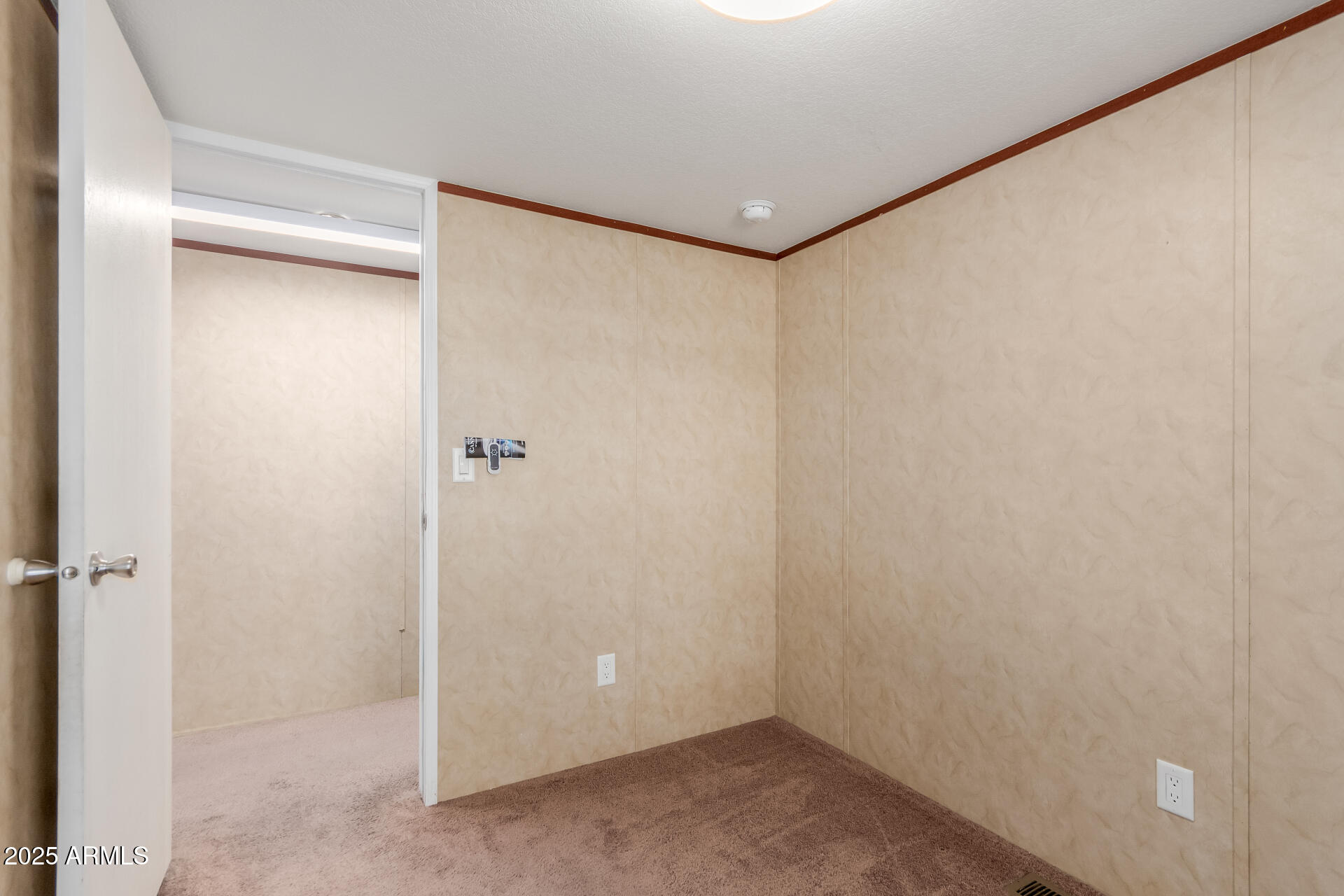 2000 South Apache Road, Unit 395 Buckeye, AZ 85326 - Photo 21 of 36 a bathroom with a shower and a glass door