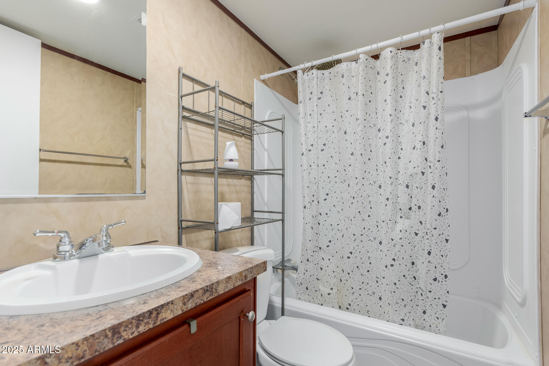 2000 South Apache Road, Unit 395 Buckeye, AZ 85326 - Photo 23 of 36 a bathroom with a granite countertop sink toilet and shower