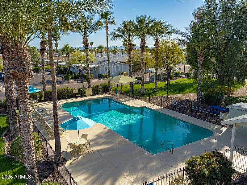 2000 South Apache Road, Unit 395 Buckeye, AZ 85326 - Photo 33 of 36 a view of a backyard with a patio