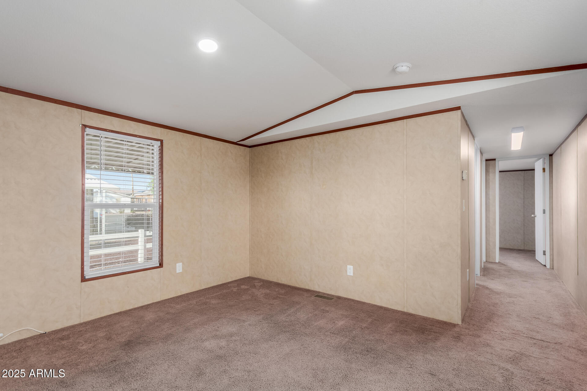 2000 South Apache Road, Unit 395 Buckeye, AZ 85326 - Photo 6 of 36 an empty room with windows and closet