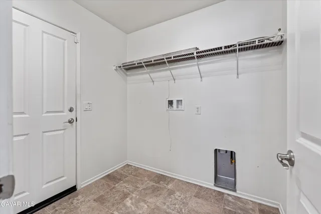 a view of a room with rack on the wall