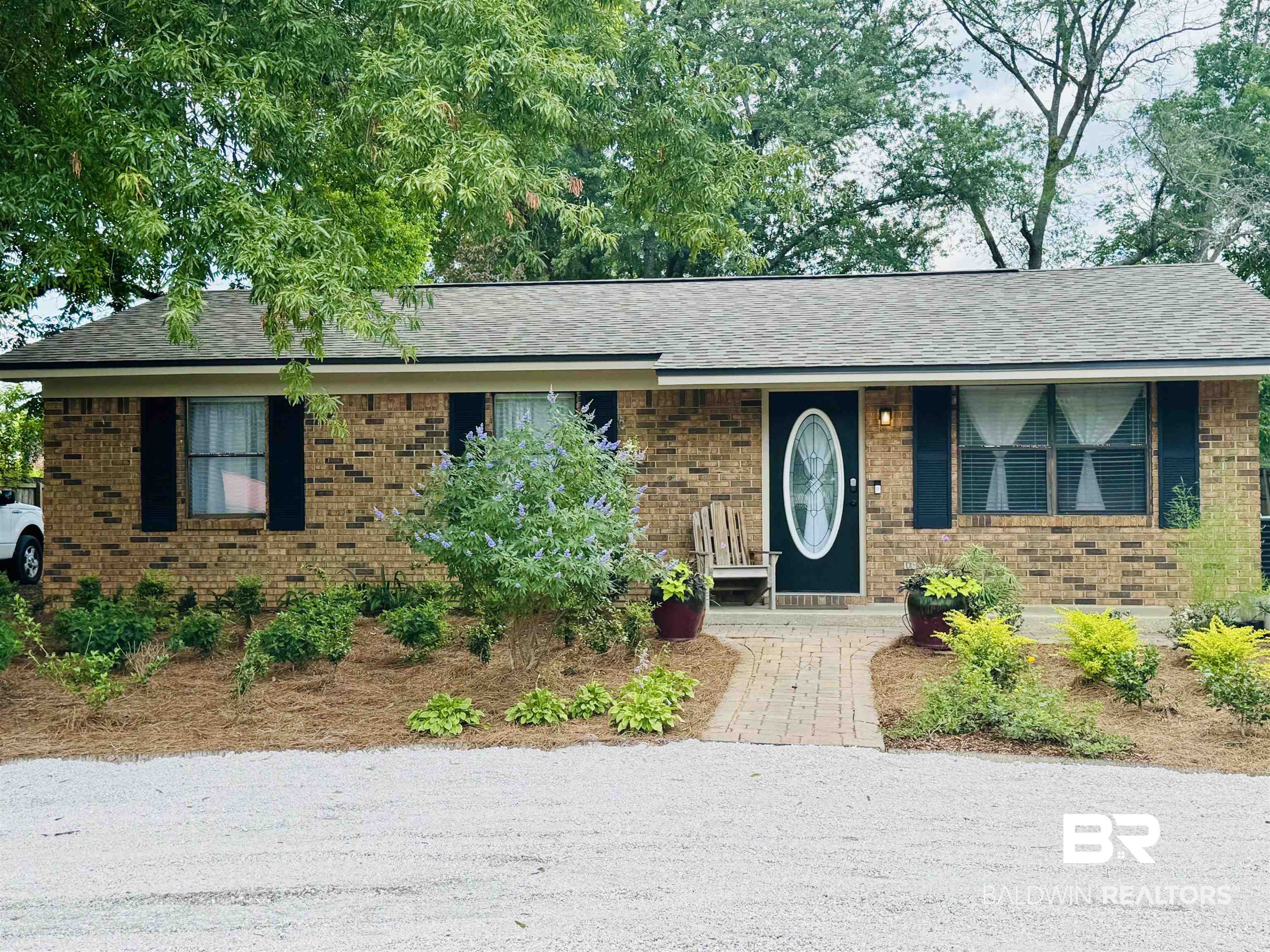 2274 Foshee Road Brewton, AL 36426 - Photo 3 of 23 Single story home featuring brick siding and a shingled roof
