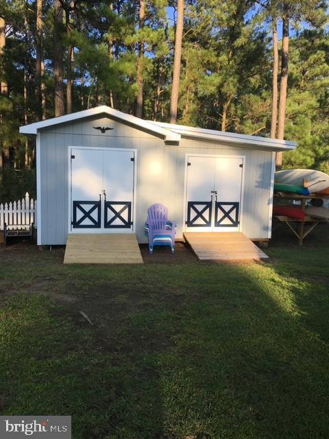 809 Seabreeze Road Cambridge, MD 21613 - Photo 46 of 75 Storage sheds with Kayak storage