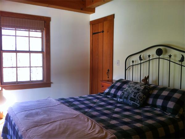 42 Jourdan Road Montgomery, MA 01085 - Photo 15 of 29 a bedroom with a bed next to a window