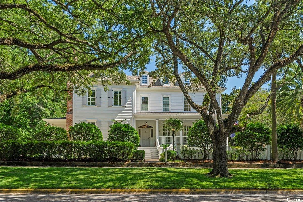 201 Broad Street Georgetown, SC 29440 - Photo 2 of 31 Southern charms exudes from front elevation.