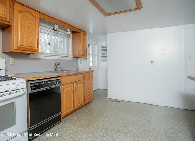 a view of cabinets and window