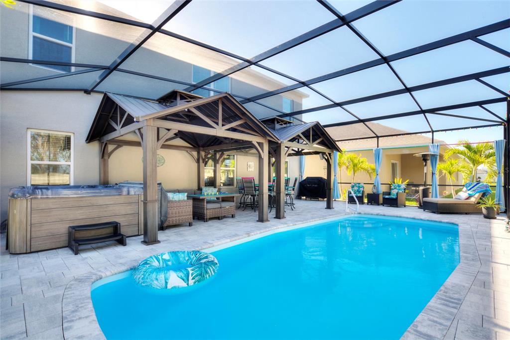 856 Sun Burst Road Winter Haven, FL 33880 - Photo 2 of 54 a view of a swimming pool with a patio