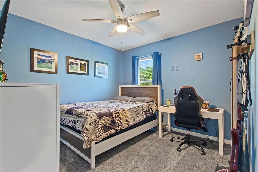 856 Sun Burst Road Winter Haven, FL 33880 - Photo 25 of 54 a bedroom with bed and a window