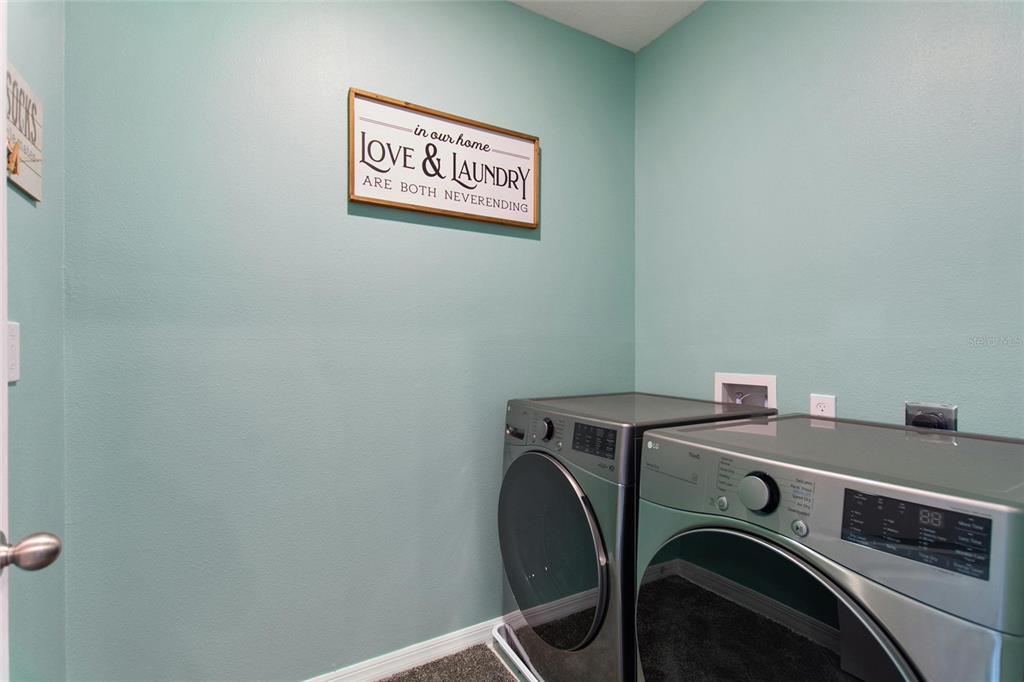 856 Sun Burst Road Winter Haven, FL 33880 - Photo 35 of 54 a utility room with dryer and washer
