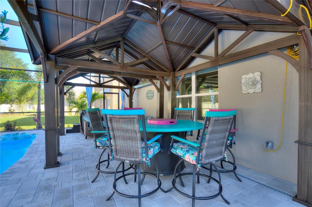 856 Sun Burst Road Winter Haven, FL 33880 - Photo 40 of 54 a view of a dining room with furniture window and outside view