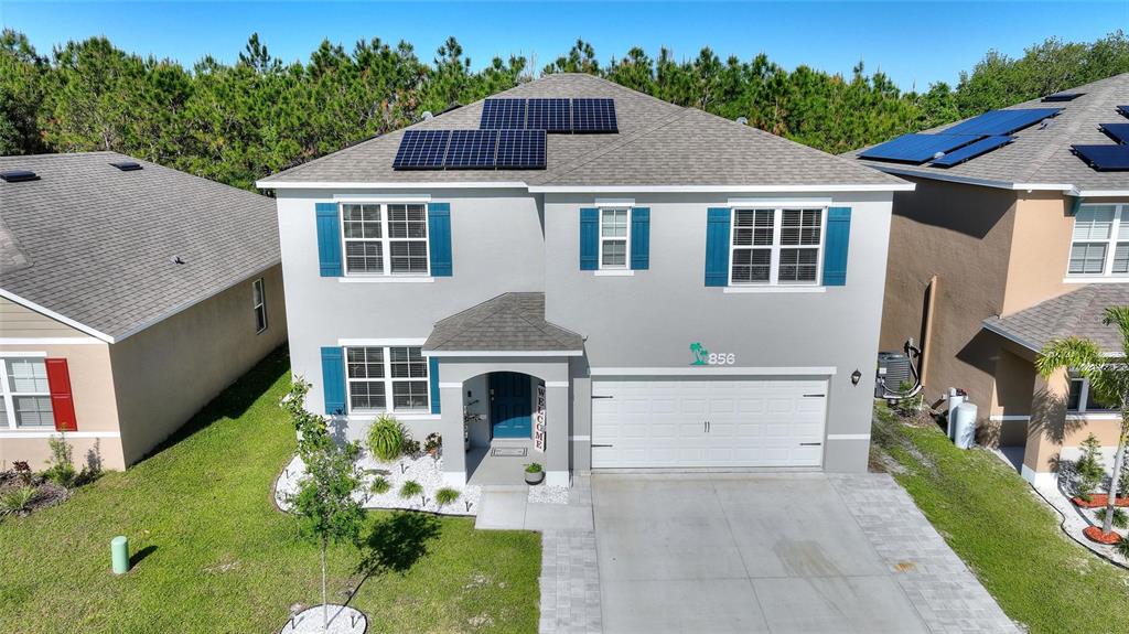 856 Sun Burst Road Winter Haven, FL 33880 - Photo 43 of 54 a aerial view of a house with garden