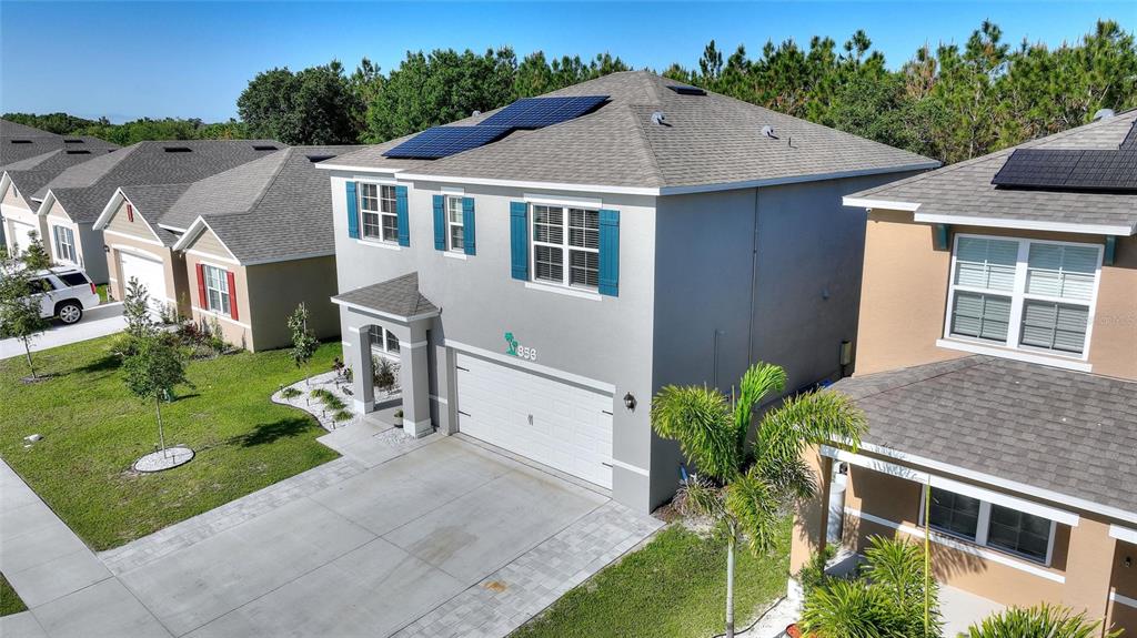 856 Sun Burst Road Winter Haven, FL 33880 - Photo 44 of 54 a aerial view of a house next to a yard