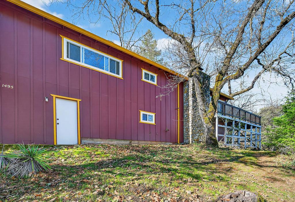 1495 Miners Spring Road Placerville, CA 95667 - Photo 31 of 43 Back of the house. The door is into the walkout Basement