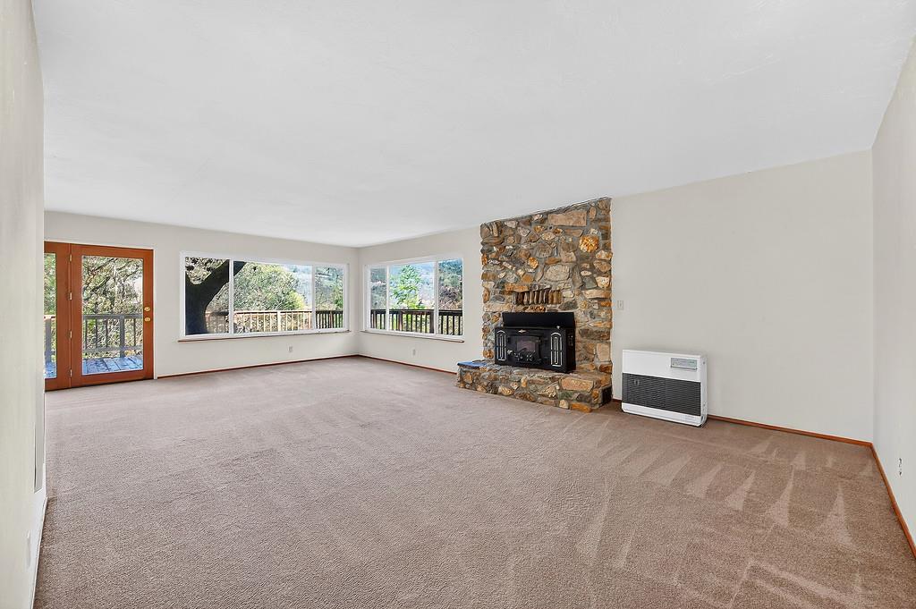 1495 Miners Spring Road Placerville, CA 95667 - Photo 9 of 43 Fireplace insert and the white box is the Kerosine Heater