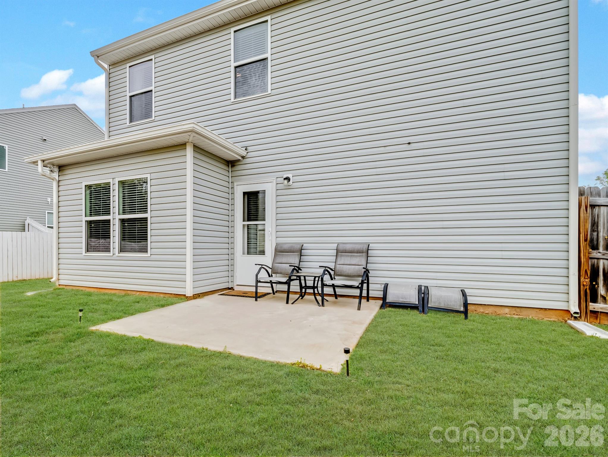 629 Gants Road York, SC 29745 - Photo 27 of 27 a backyard of a house with table and chairs