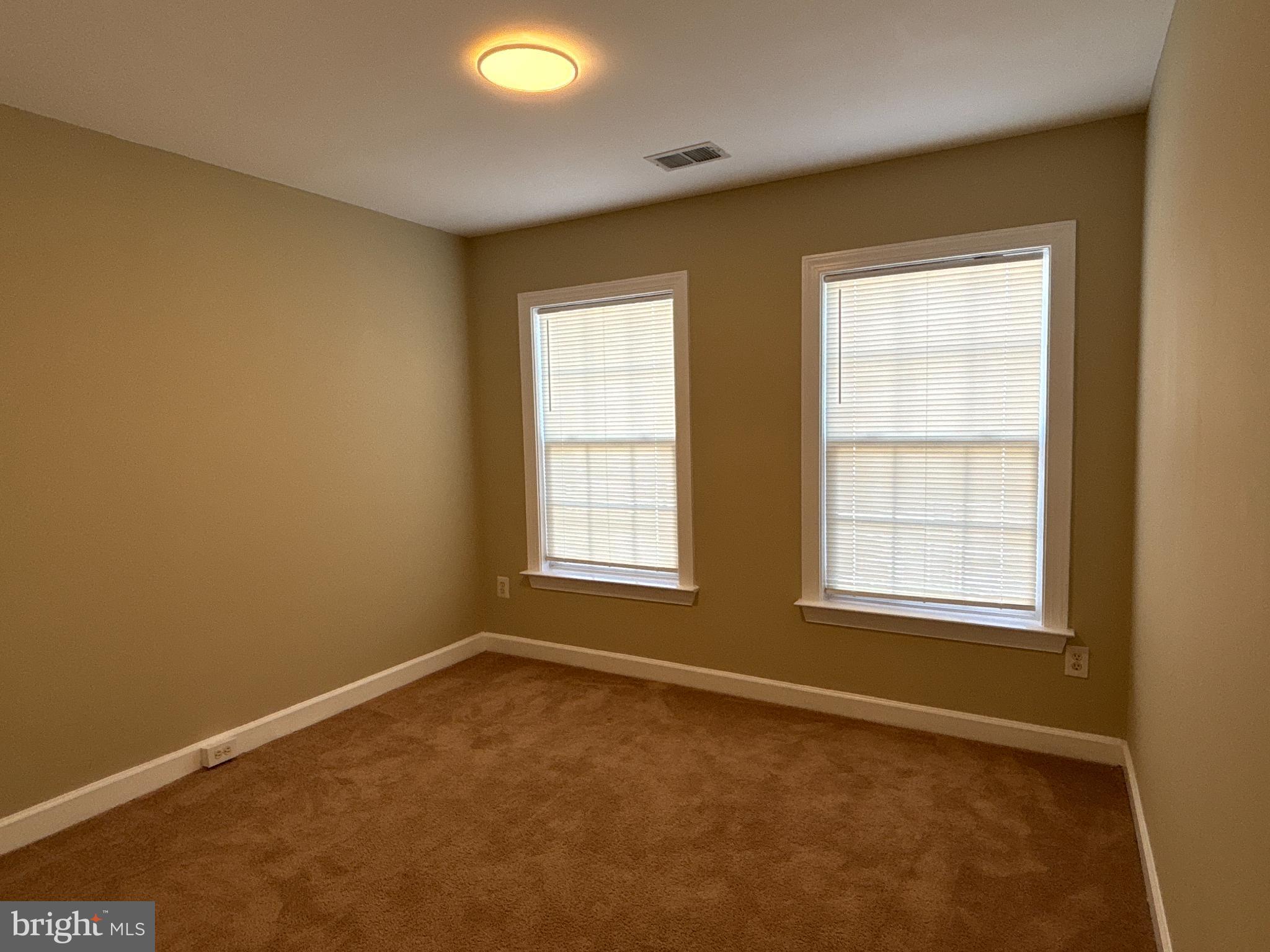 15656 Avocet Loop Woodbridge, VA 22191 - Photo 19 of 28 an empty room with a empty space and a window