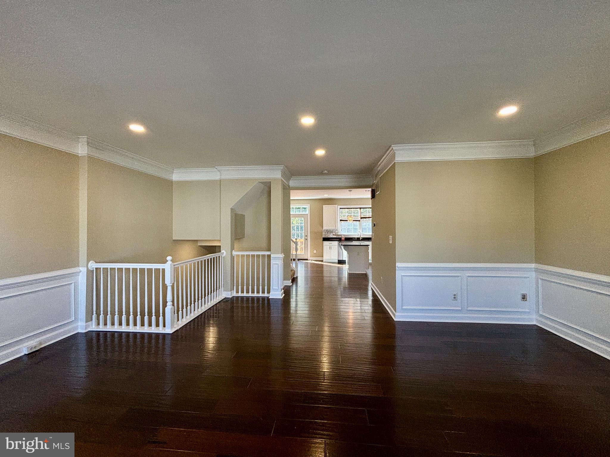 15656 Avocet Loop Woodbridge, VA 22191 - Photo 5 of 28 a view of an empty room with wooden floor
