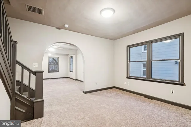 an empty room with windows