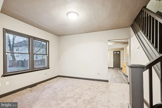 an empty room with windows