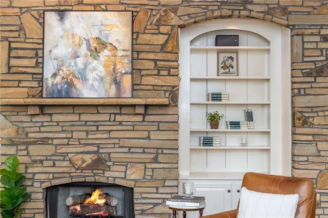 a view of a patio with a table chairs and a potted plant