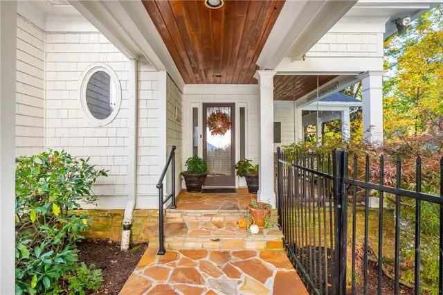 a spacious bathroom with a double vanity sink mirror and shower