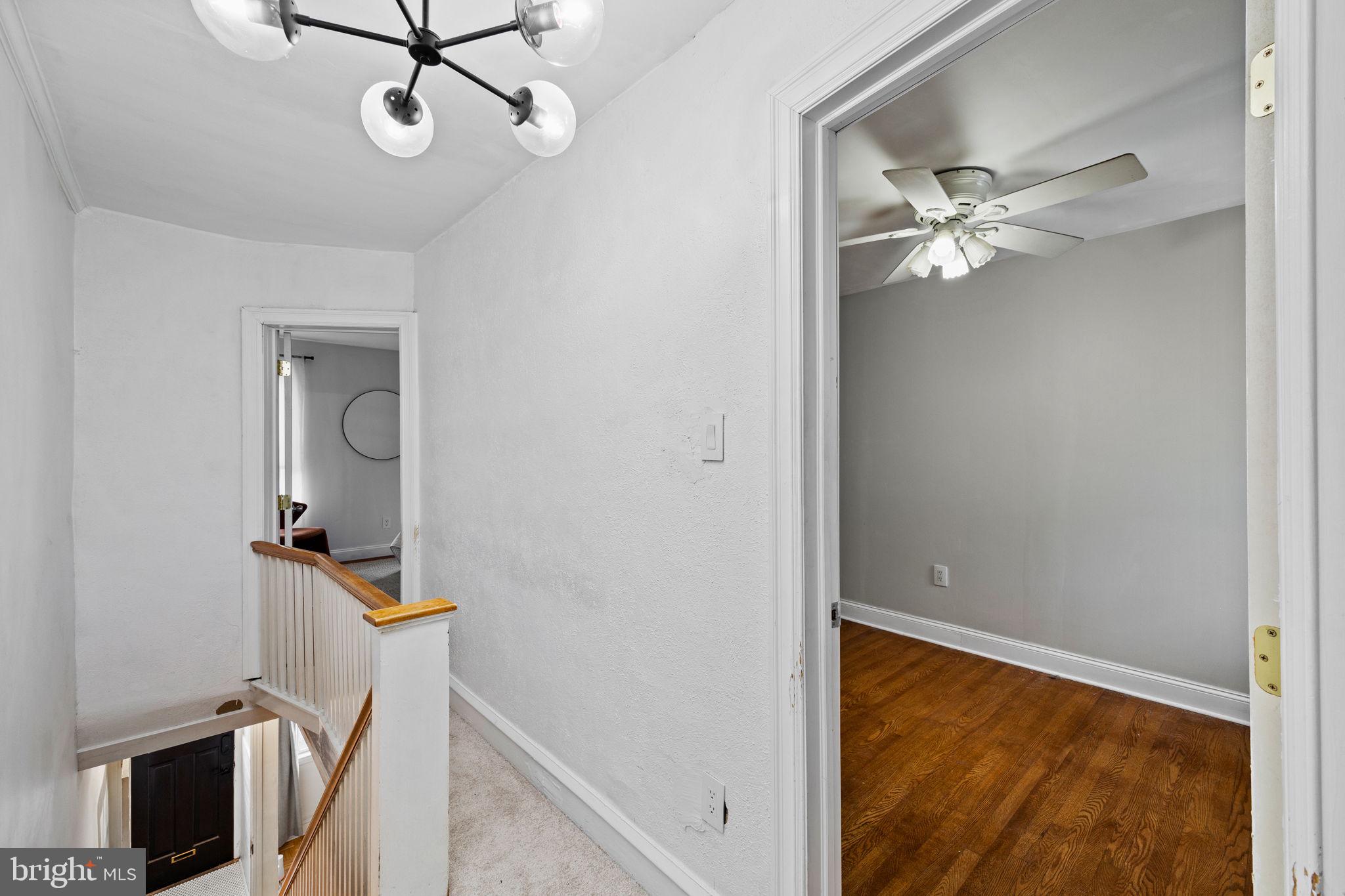 3138 Miller Street Philadelphia, PA 19134 - Photo 18 of 30 a view of a room with rack and wooden floor