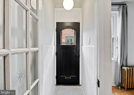 a view of entryway with a front door