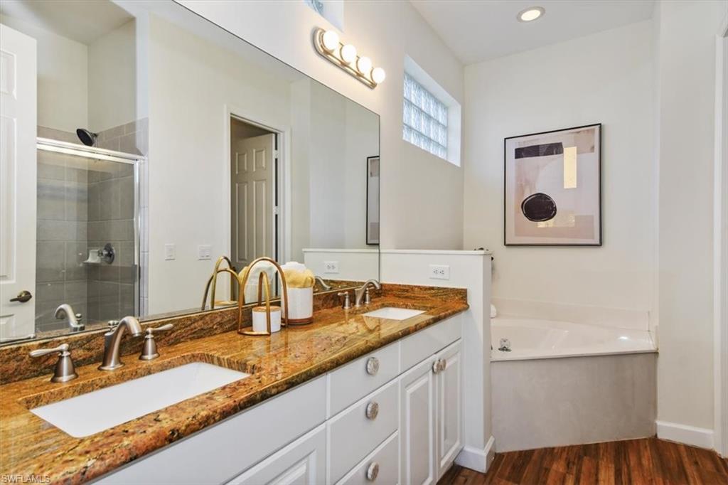 3351 Sandpiper Way Naples, FL 34109 - Photo 15 of 47 Primary bath