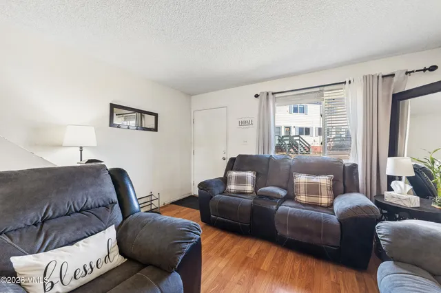 a living room with furniture and a couch