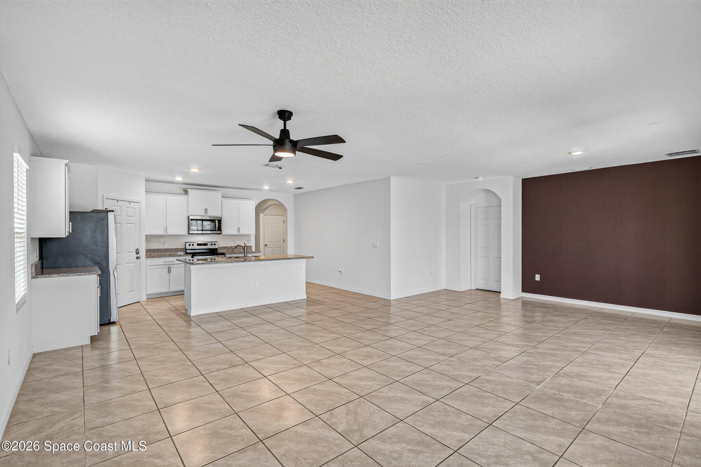 3419 Foggy Mist Road Southeast Palm Bay, FL 32909 - Photo 16 of 39 Living/Dining