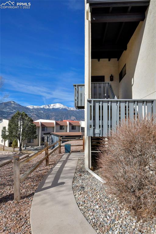 1142 Fontmore Road, Unit C Colorado Springs, CO 80904 - Photo 25 of 33 a view of a porch with a floor to ceiling window and wooden fence