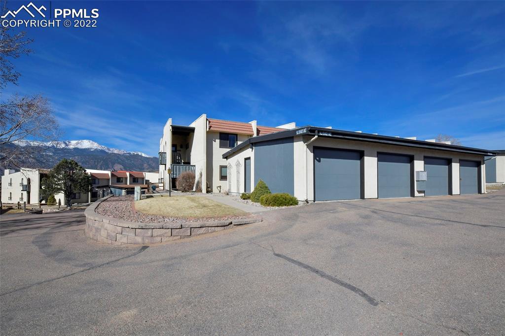 1142 Fontmore Road, Unit C Colorado Springs, CO 80904 - Photo 26 of 33 a front view of a house with a yard