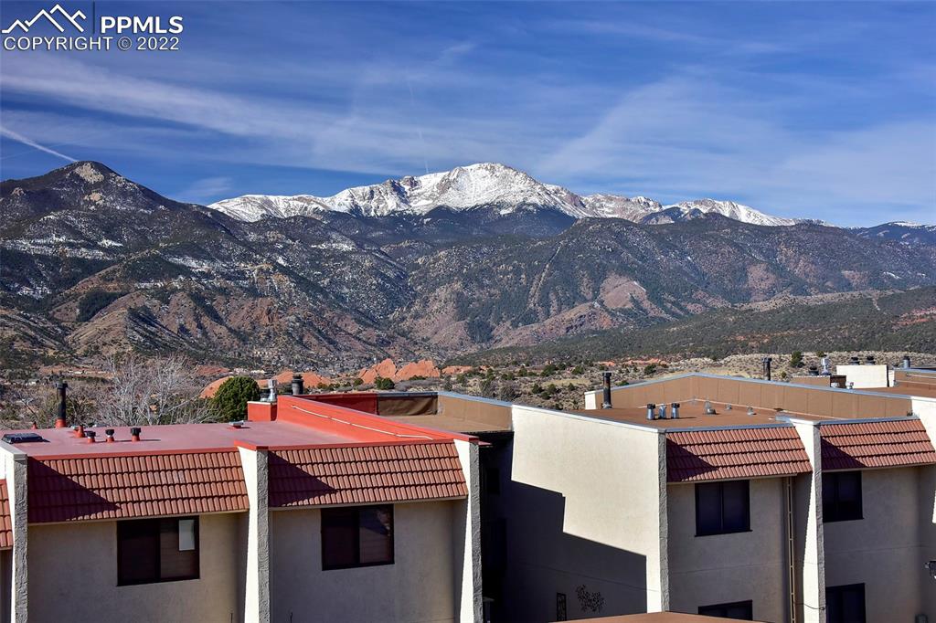 1142 Fontmore Road, Unit C Colorado Springs, CO 80904 - Photo 32 of 33 a view of a house with a mountain