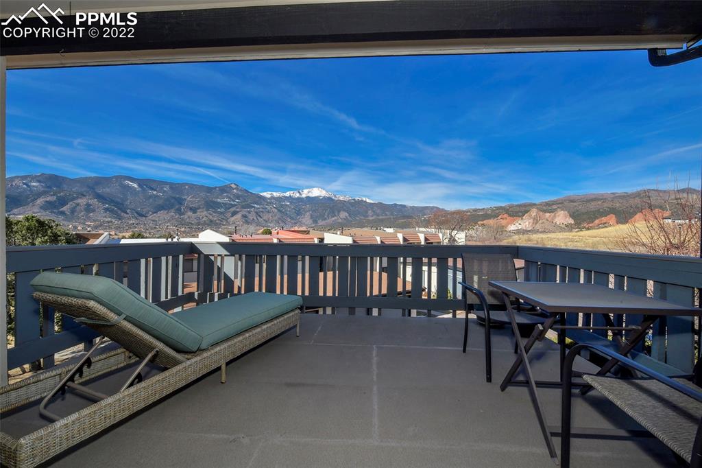 1142 Fontmore Road, Unit C Colorado Springs, CO 80904 - Photo 4 of 33 a view of a chairs and table on the terrace