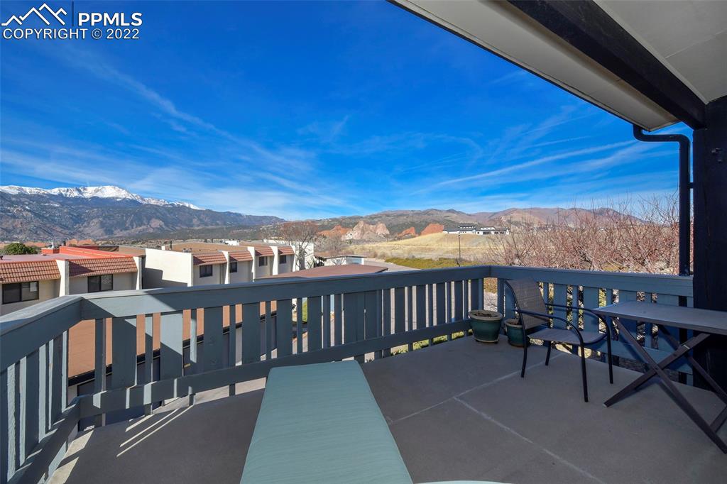 1142 Fontmore Road, Unit C Colorado Springs, CO 80904 - Photo 5 of 33 a view of a chairs and table in the balcony
