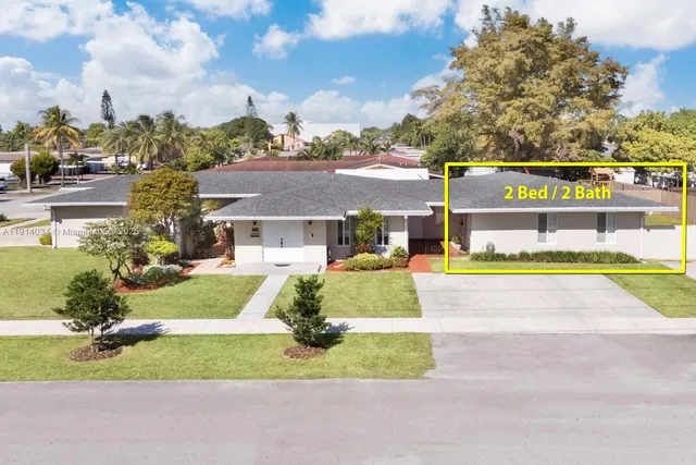 a view of a house with a big yard