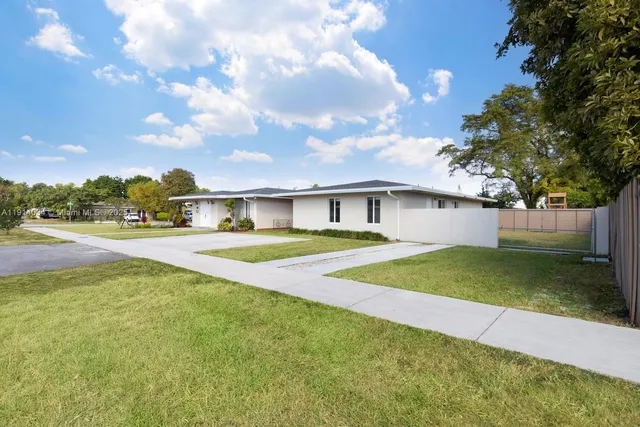 a view of outdoor space yard and front view of a house