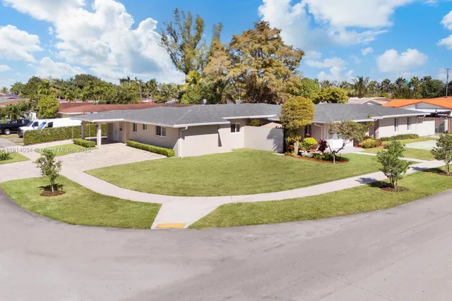 a view of a house with a swimming pool