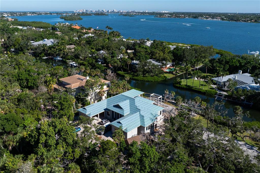 5215 Hidden Harbor Road Sarasota, FL 34242 - Photo 13 of 22 an aerial view of a house with a lake view