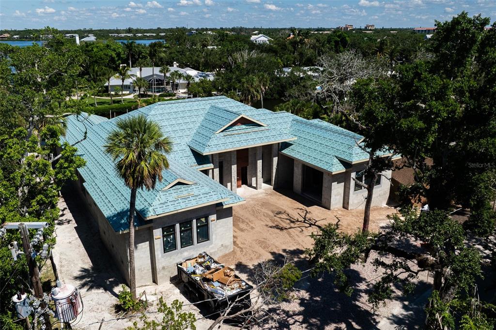5215 Hidden Harbor Road Sarasota, FL 34242 - Photo 14 of 22 an aerial view of a house with a yard