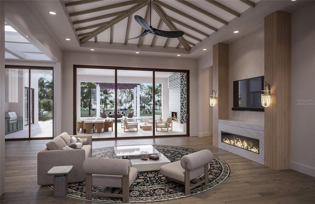 5215 Hidden Harbor Road Sarasota, FL 34242 - Photo 6 of 22 a living room with furniture and a floor to ceiling window