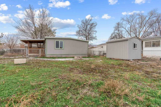a house view with a backyard space